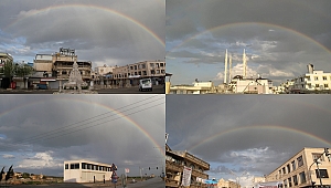 Güneşli havada yağan yağmur çift gökkuşağı oluşturdu