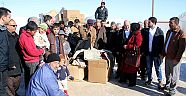 Midyat Belediyesi ve Ak Parti’den sığınmacılara kışlık yardım